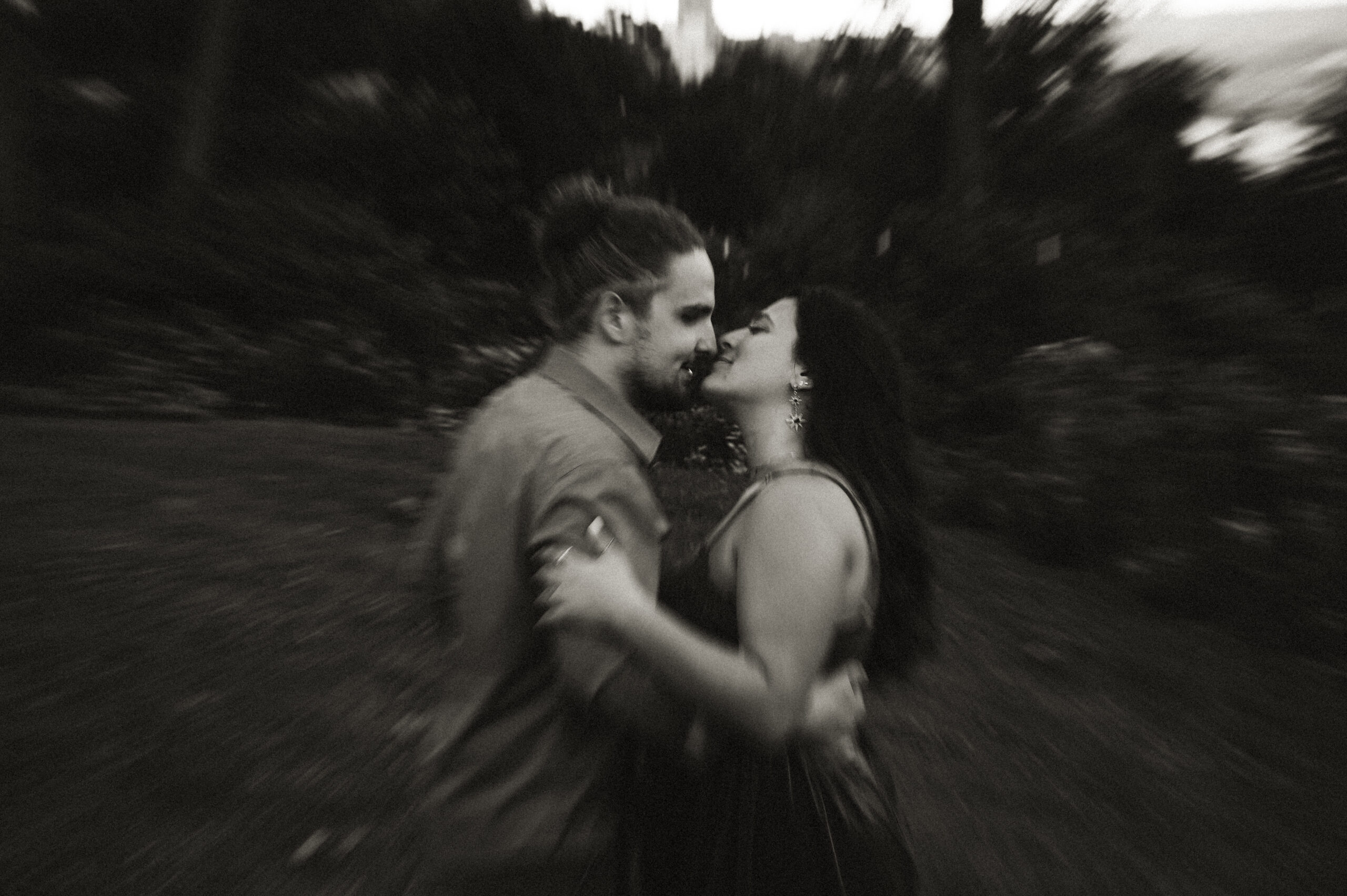 Couple about to kiss at Grandview Overlook during anniversary photo shoot