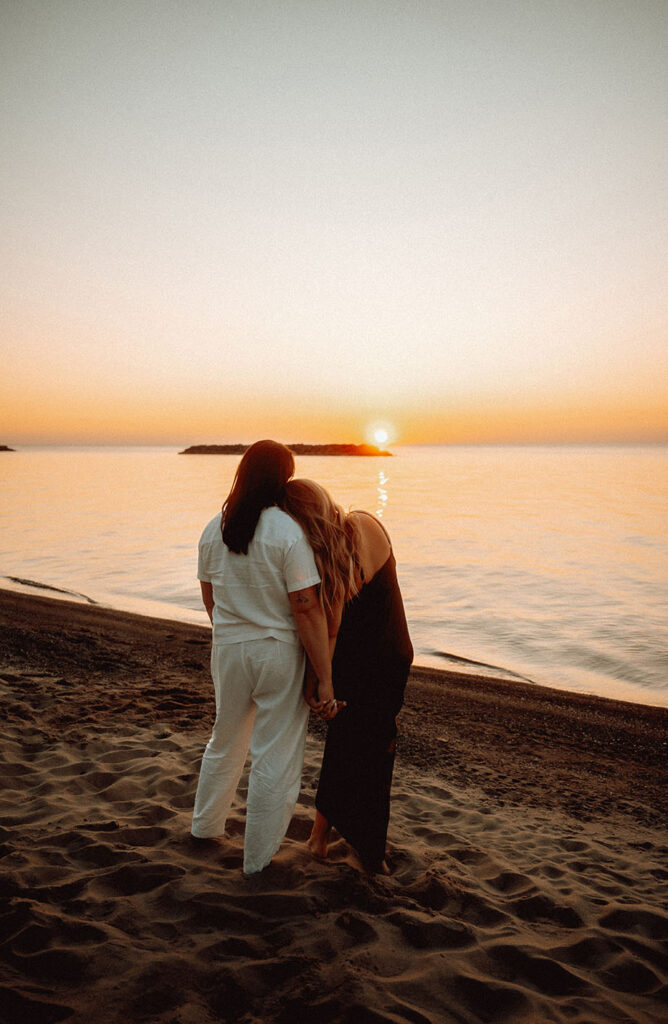 Couple embracing each other during sunset at beach Engagement