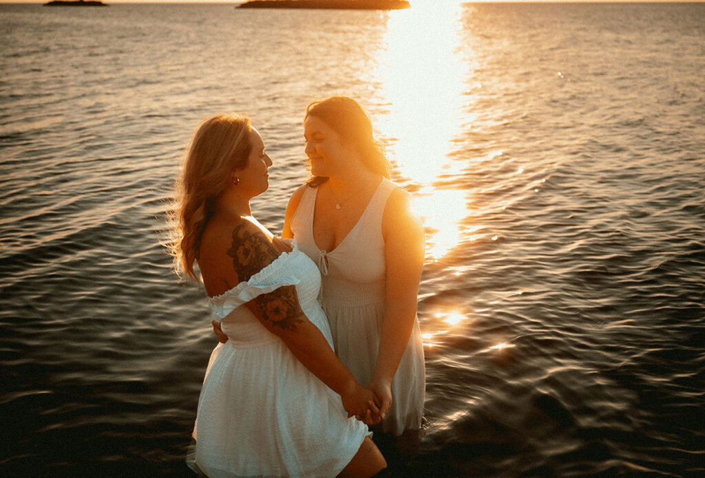 Couple embracing each other during sunset at beach Engagement