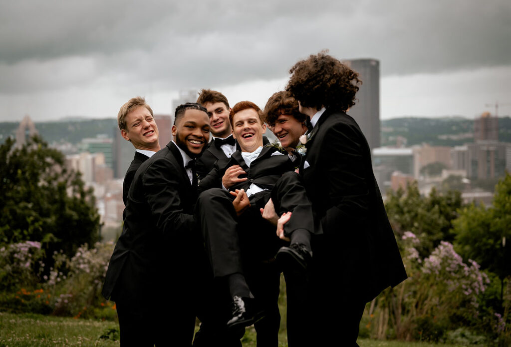 Groom being Lifted by Groomsmen at Emerald Park