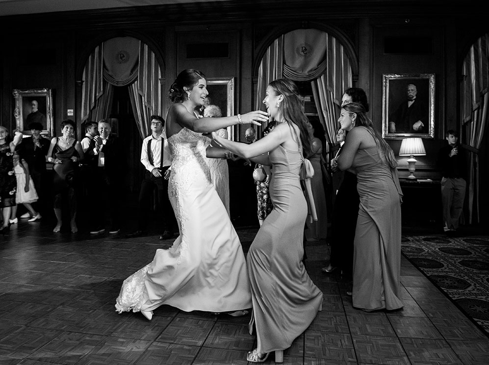 Bride and Bridesmaid dancing at Duquesne Club Wedding