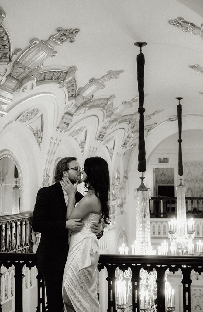Artistic black-and-white photo of couple with soft natural light at Heinz Hall.