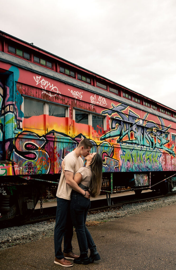 Romantic rainy engagement photo at The Highline overlooking the Monongahela River and downtown Pittsburgh.