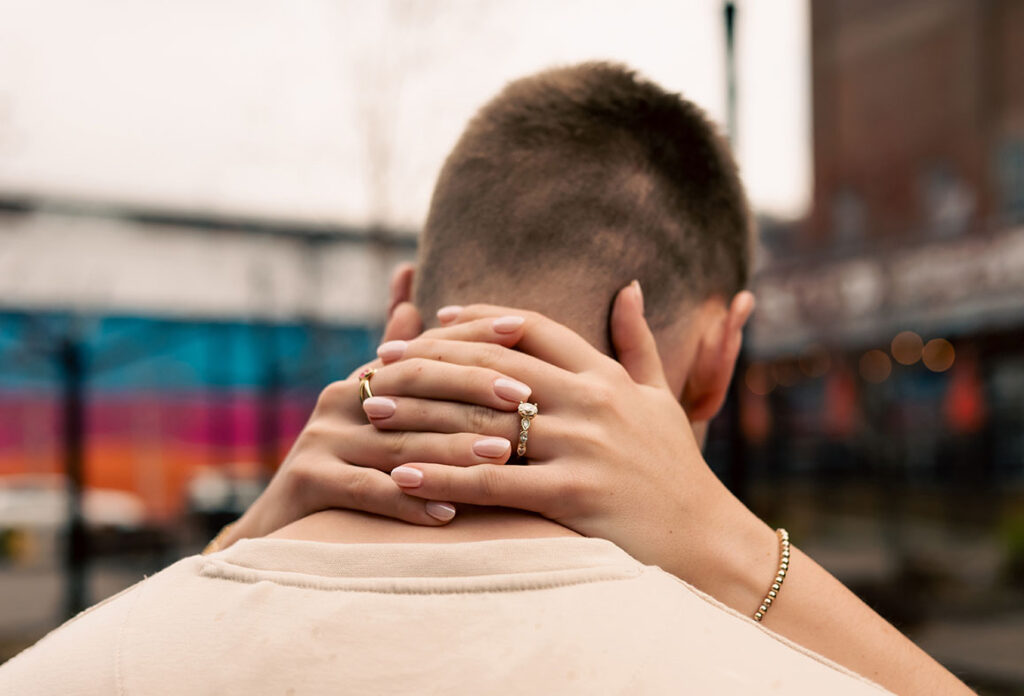 Romantic rainy engagement photo at The Highline overlooking the Monongahela River and downtown Pittsburgh.