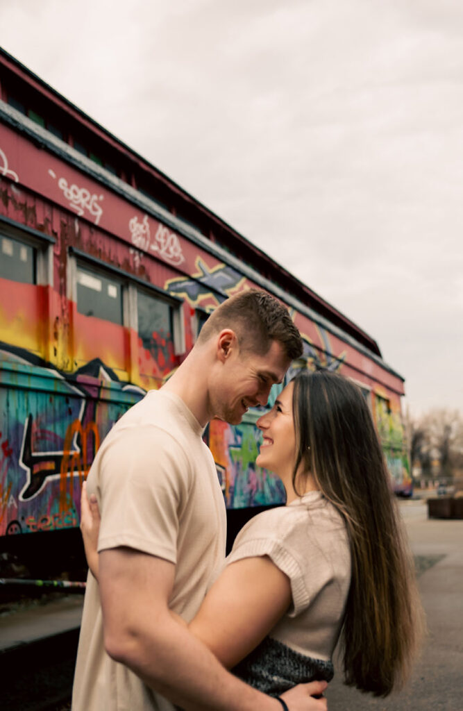 Romantic rainy engagement photo at The Highline overlooking the Monongahela River and downtown Pittsburgh.