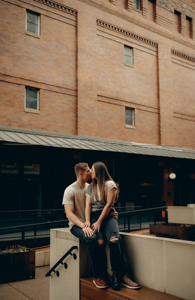 Romantic rainy engagement photo at The Highline overlooking the Monongahela River and downtown Pittsburgh.
