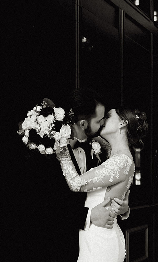 BW Couple kissing during their bridal photos in Cincinnati 