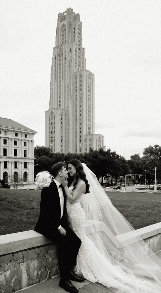 BW Bride and Groom hugging in front of Cathedral of Learning