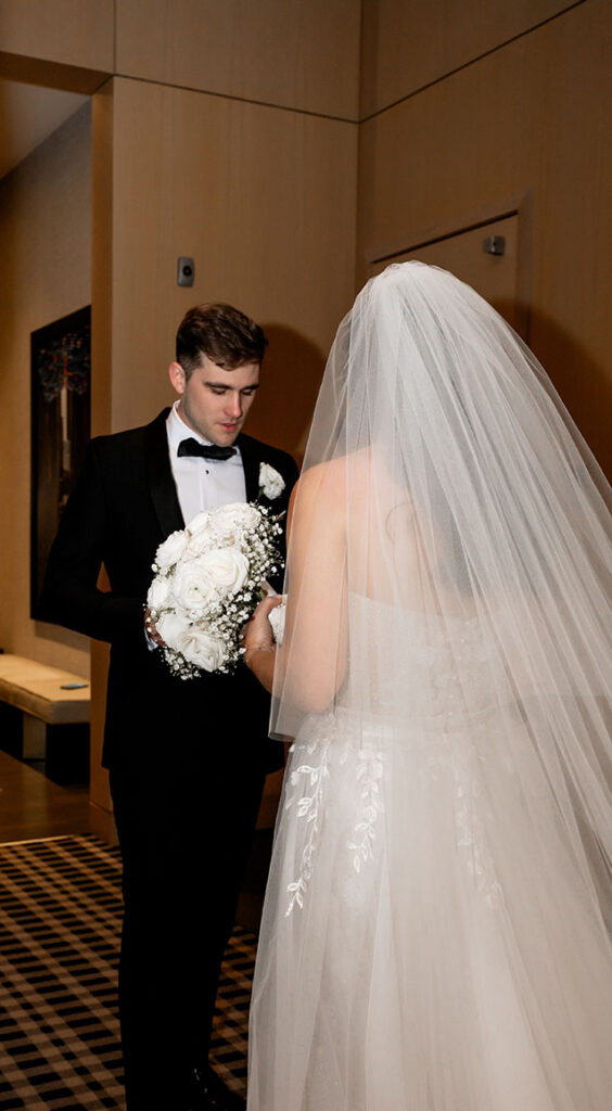 Bride and Groom During their First look at the Oaklander
