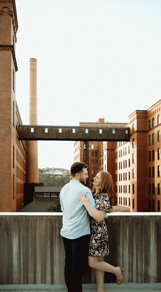 Couple looking at each other during Strip District Engagement