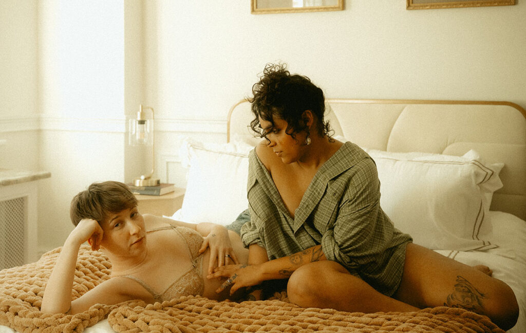 Couple in bed during their boudoir Engagement Photos in Pittsburgh