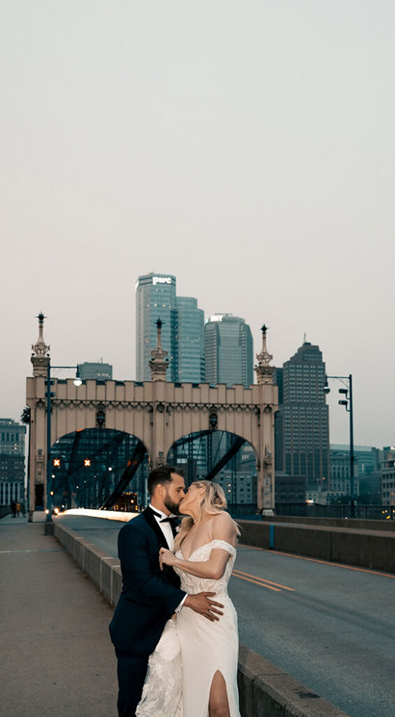 Bride and Groom Kiss at Smithfield Street Bridge in Pittsburgh