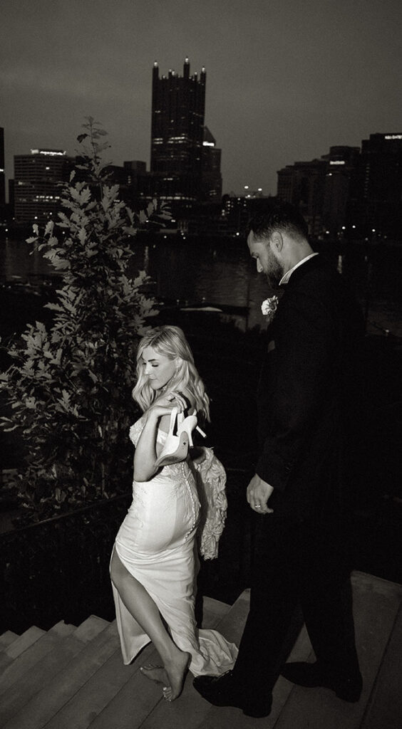 Bride and Groom go down the steps of the Smithfield Street Bridge in Pittsburgh