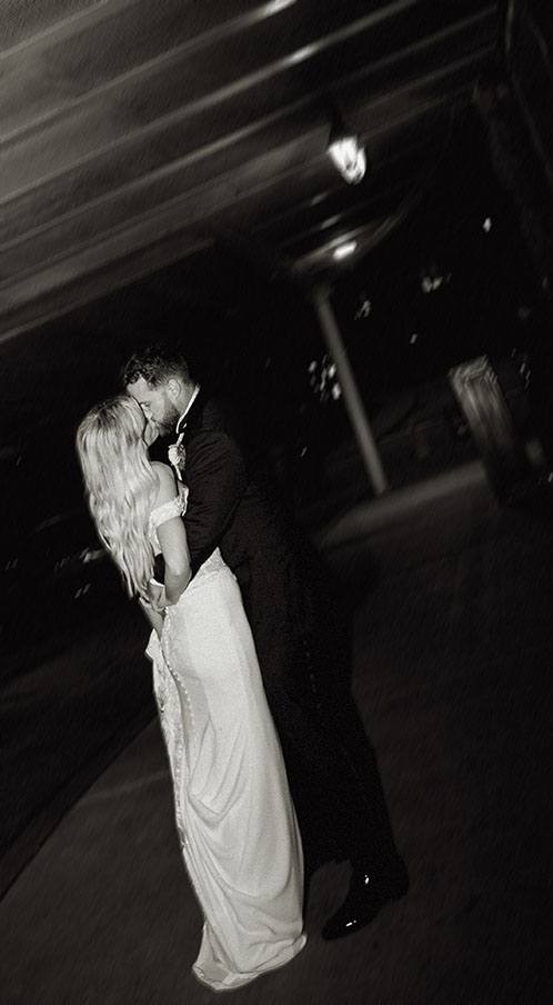 BW Editorial Photo of bride and groom kissing