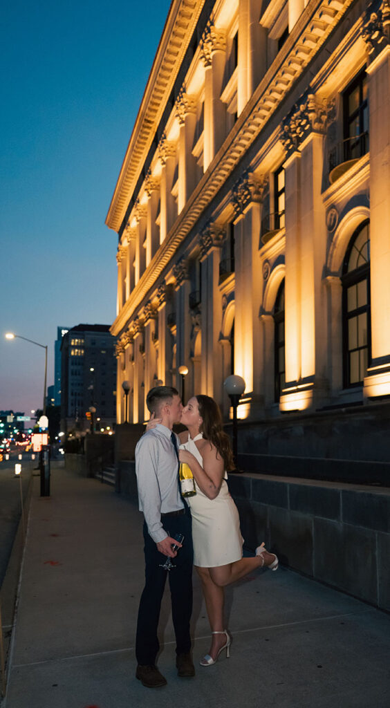 Couple kissing during summer engagement