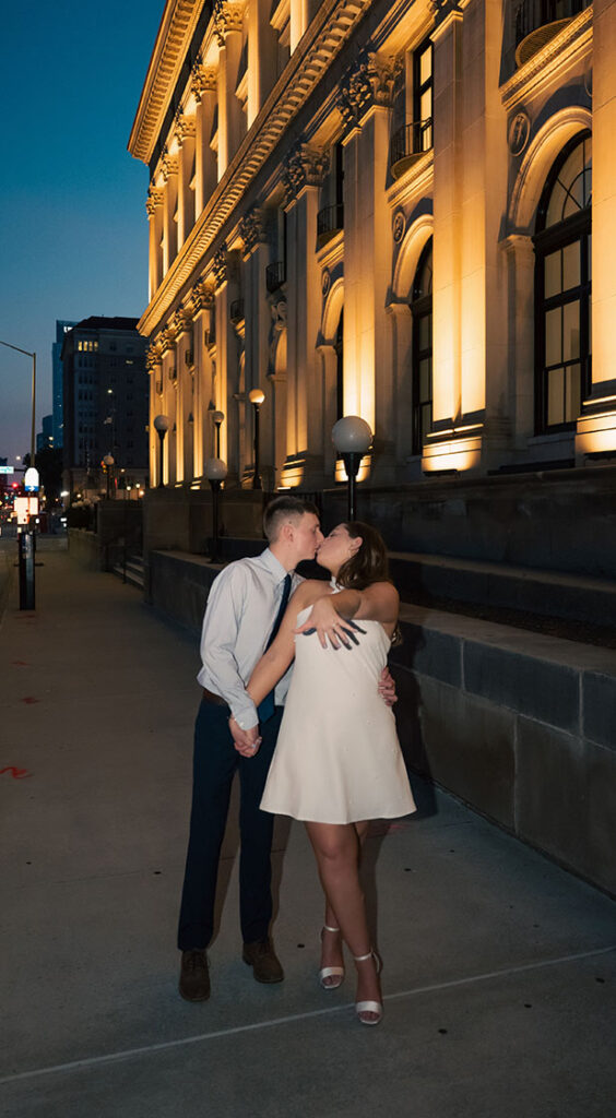 Couple Showing off engagement ring