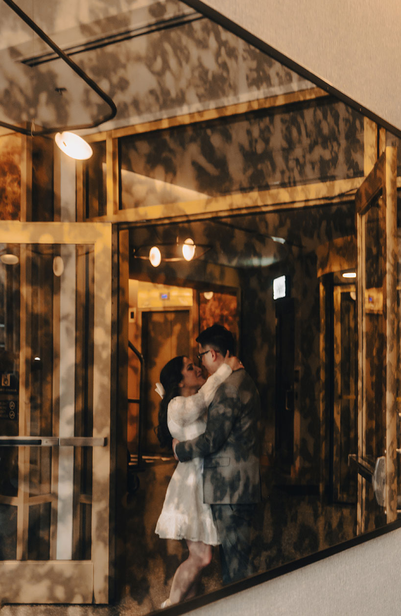 Couple's Reflection during their Engagement at The Oaklander Engagement in Pittsburgh