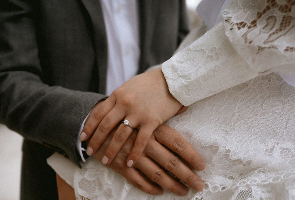 Engaged hand of woman during her engagement in Oakland