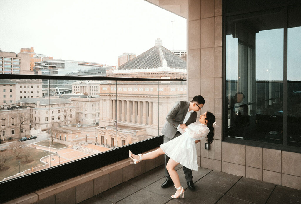 Couple Dancing in the Patio at the Oaklander Hotel during their Engagement