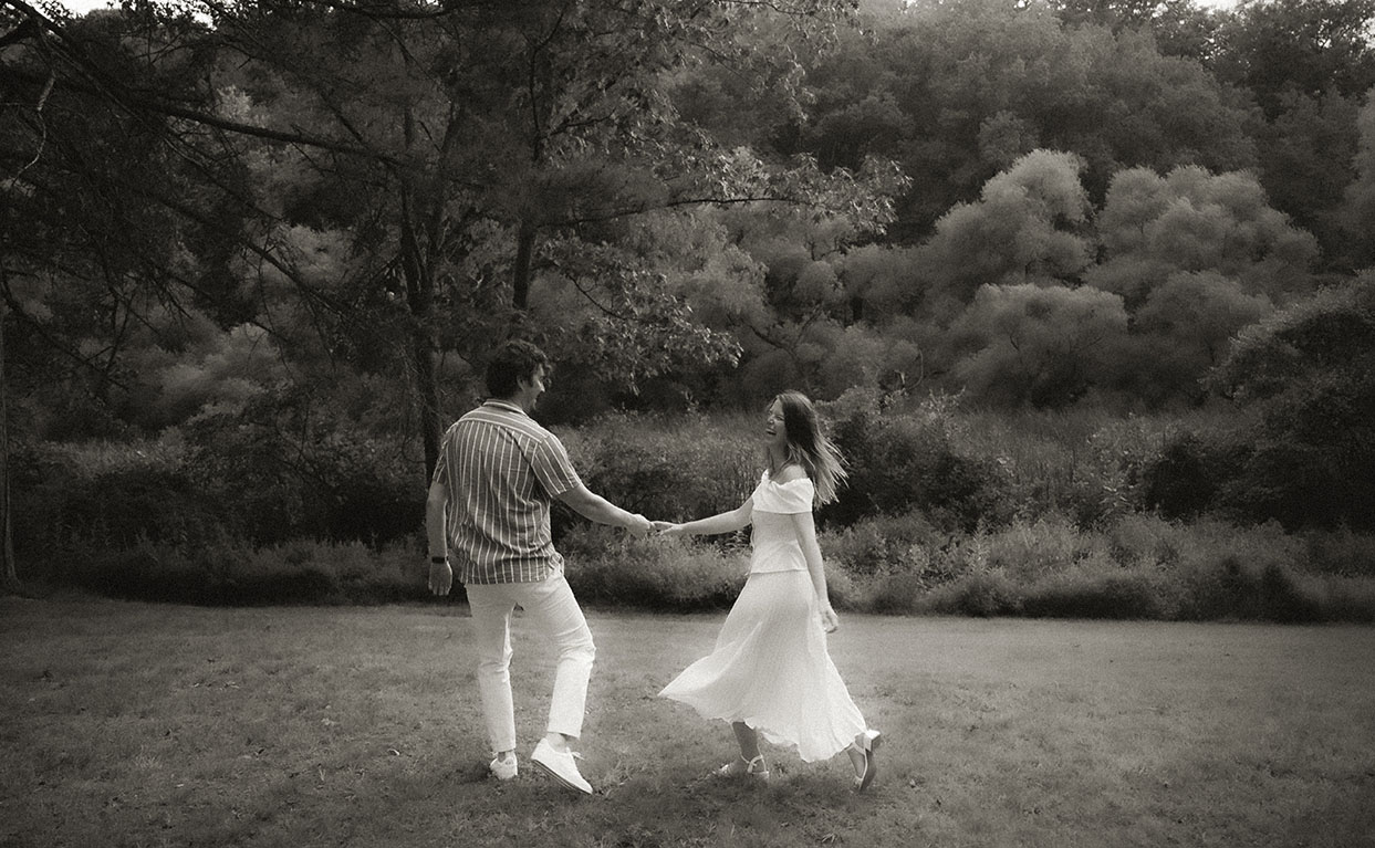 Romantic Couple laughing during engagement