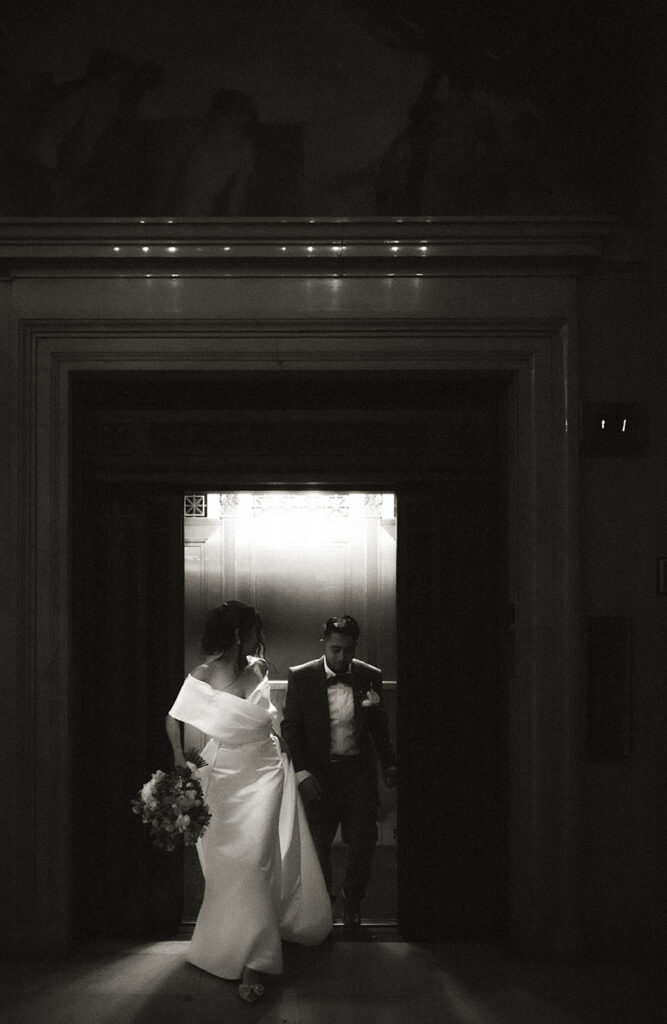 Bride and Groom exit Carnegie Museum of Art running
