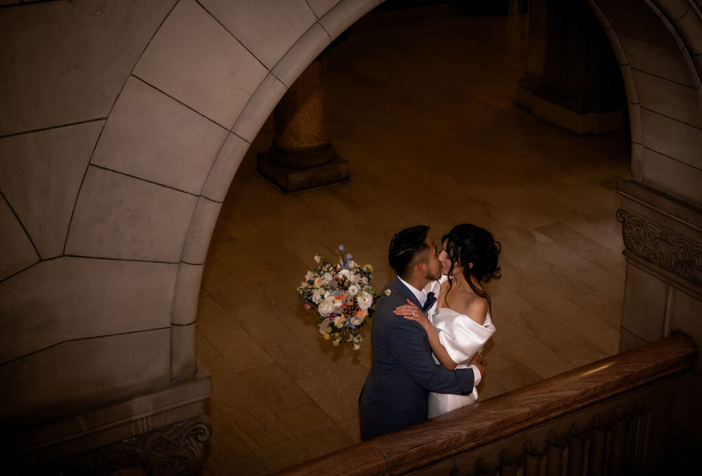 Bride and Groom look at each other at Allegheny Courthouse Wedding