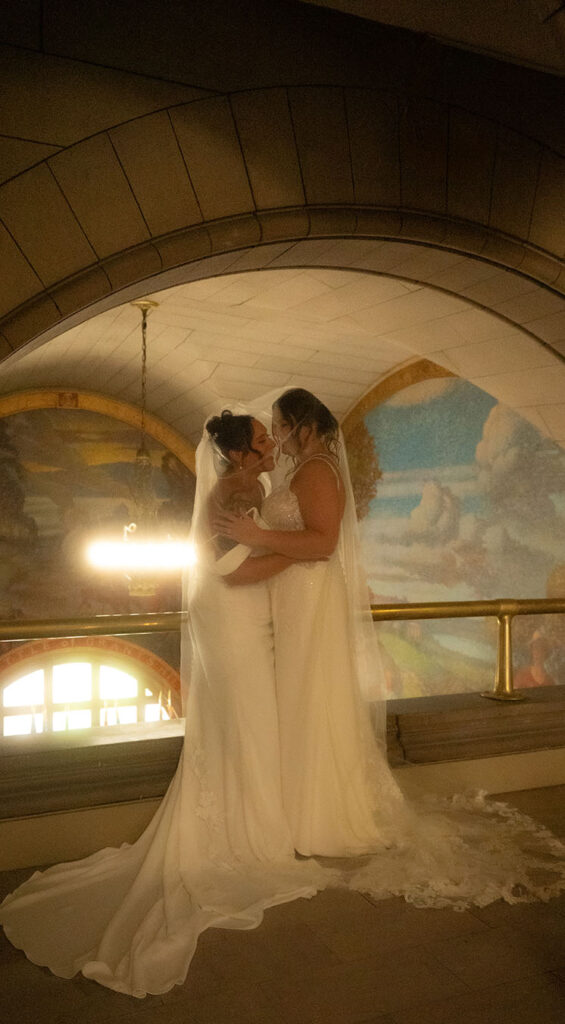 Couple embracing inside Allegheny County Courthouse in Pittsburgh