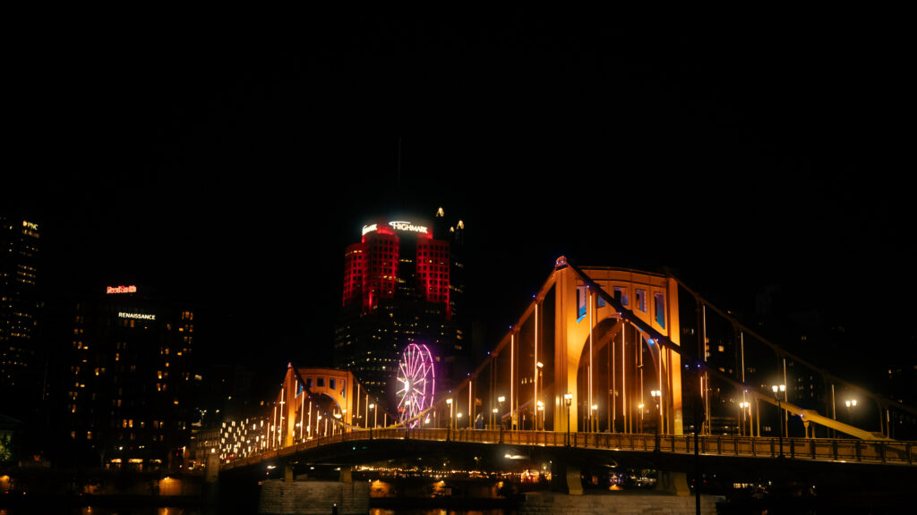 Golden string lights and Ferris wheel reflections — the perfect fall evening in Pittsburgh.
