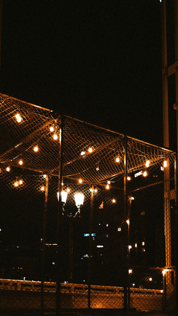 Golden string lights and Ferris wheel reflections — the perfect fall evening in Pittsburgh.