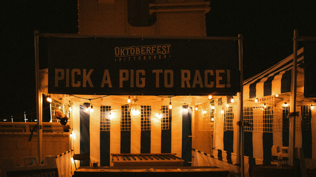The charm of fall nights in Pittsburgh — cozy sweaters, laughter, and love all around.