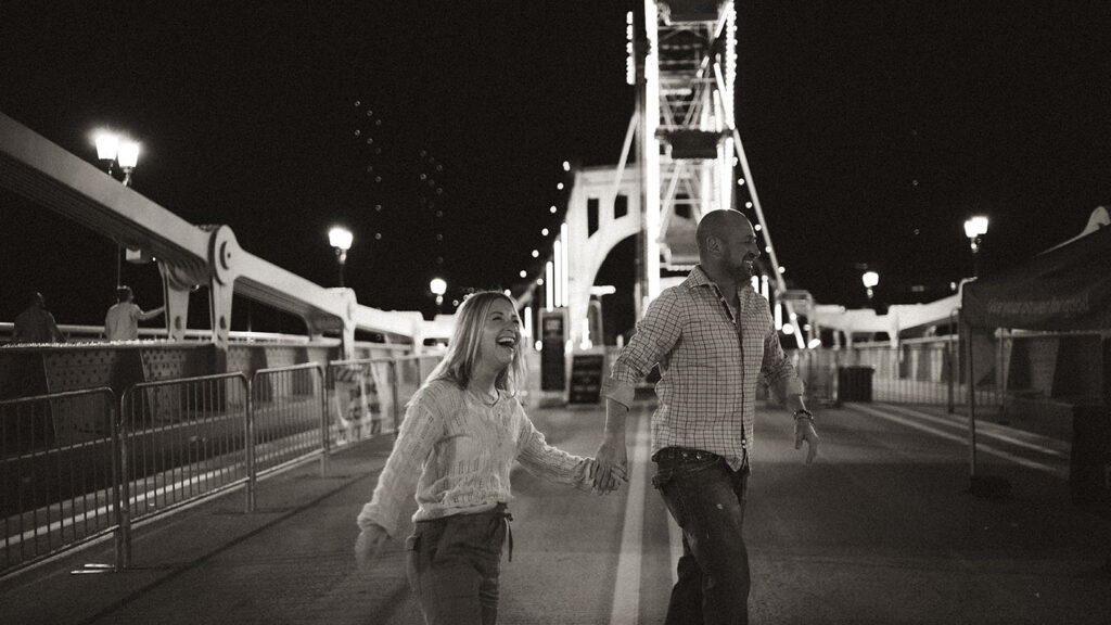 Romantic night photo at Pittsburgh fall festival with Ferris wheel lights