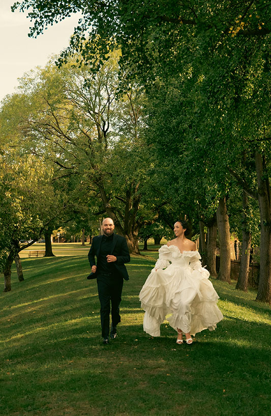 Romantic Bride and Groom Running after Courthouse Wedding in Pittsburgh
