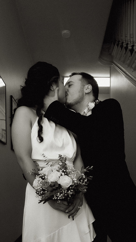 Couple Kiss after they married at Evans City Magistrate