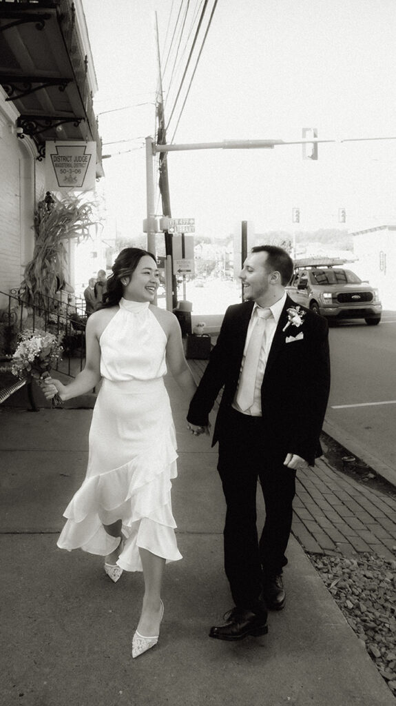 Bride and Groom Walking Off Just Married 