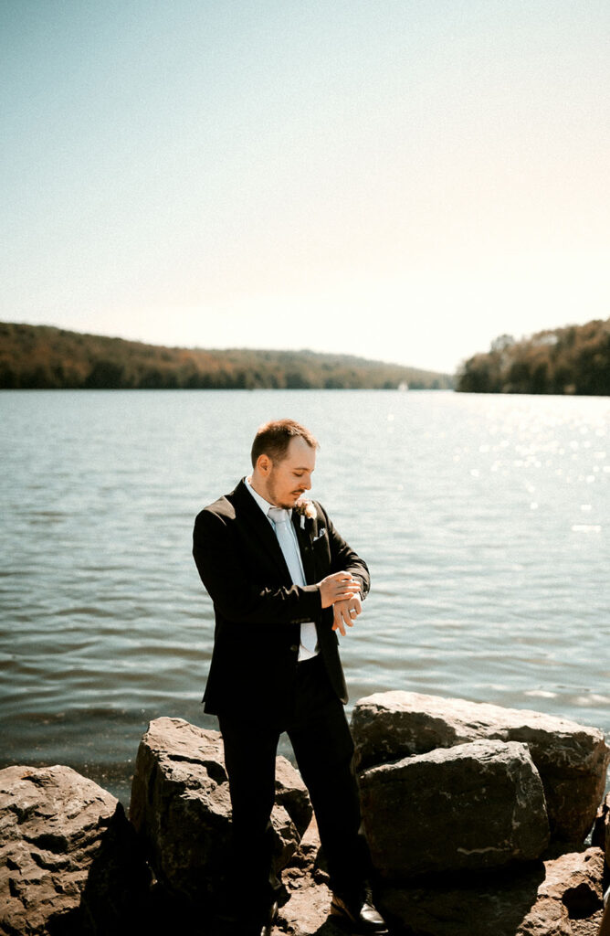 Groom Standing near the water at Moraine State Park