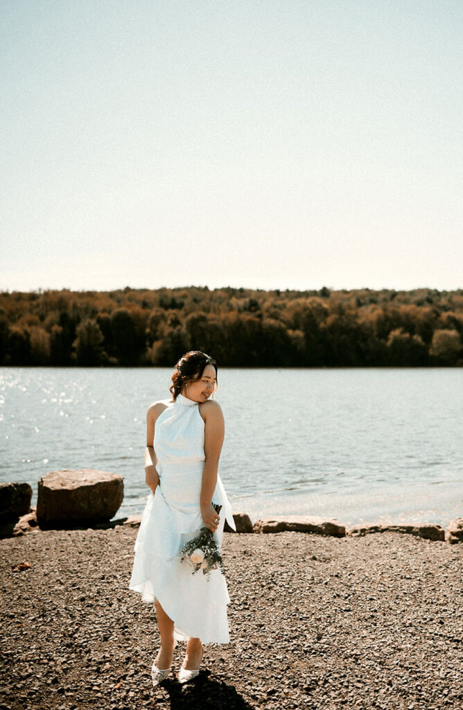 Bride holding bridal bouquet in Moraine State Park