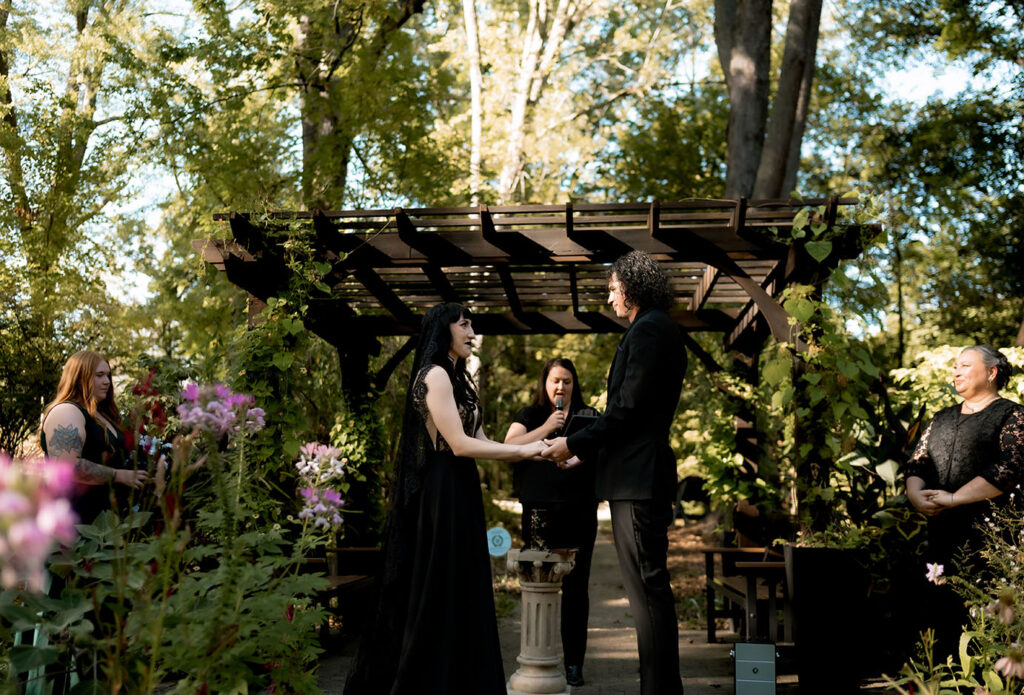 Moody fall wedding details with black and purple theme
