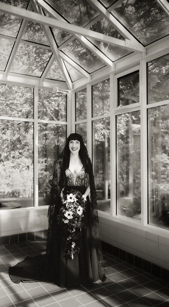 Bride in black lace wedding dress from Gemma’s Bridal at Robin Hill Park