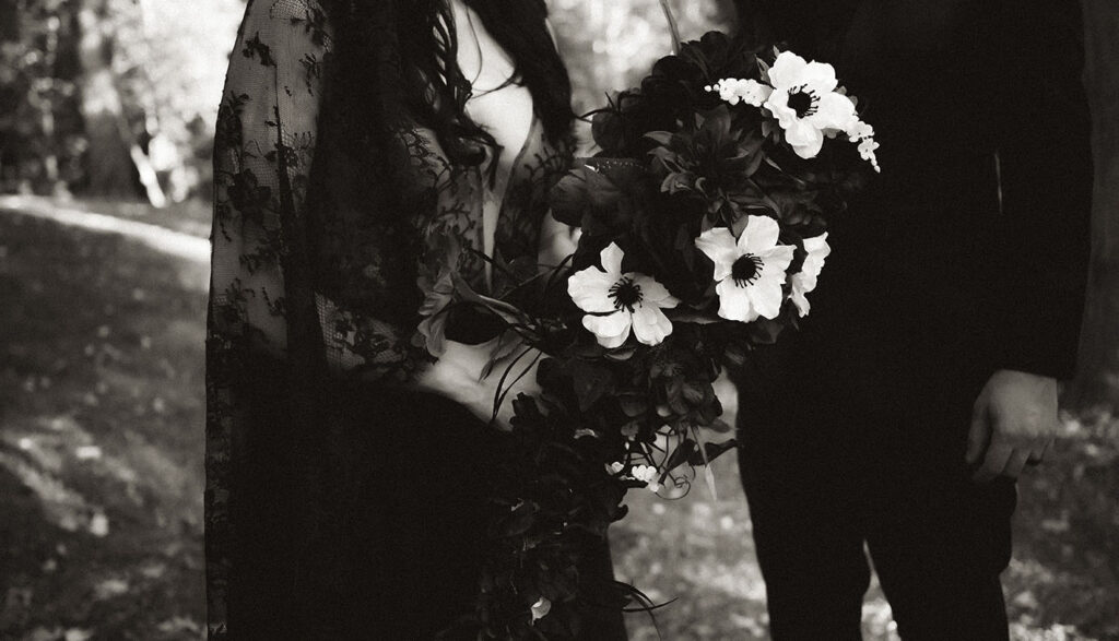 Bride in black lace wedding dress from Gemma’s Bridal at Robin Hill Park