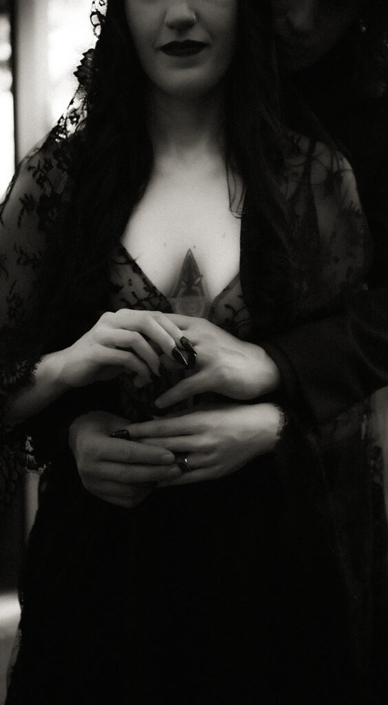 Bride and groom rings in October Black theme wedding