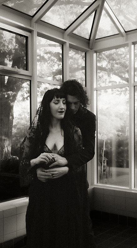 Romantic Bride and Groom During their Black theme wedding in Robin Hill Park