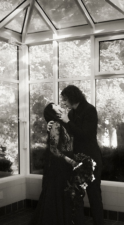 Romantic Bride and Groom During their Black theme wedding in Robin Hill Park