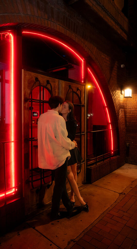 Romantic photo of a couple outside Tilden in Downtown Pittsburgh where they first met.