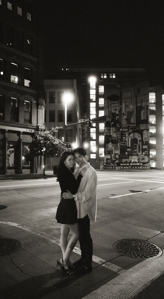 Documentary-style image of a couple sharing a quiet moment Outside of Tilden in Pittsburgh.