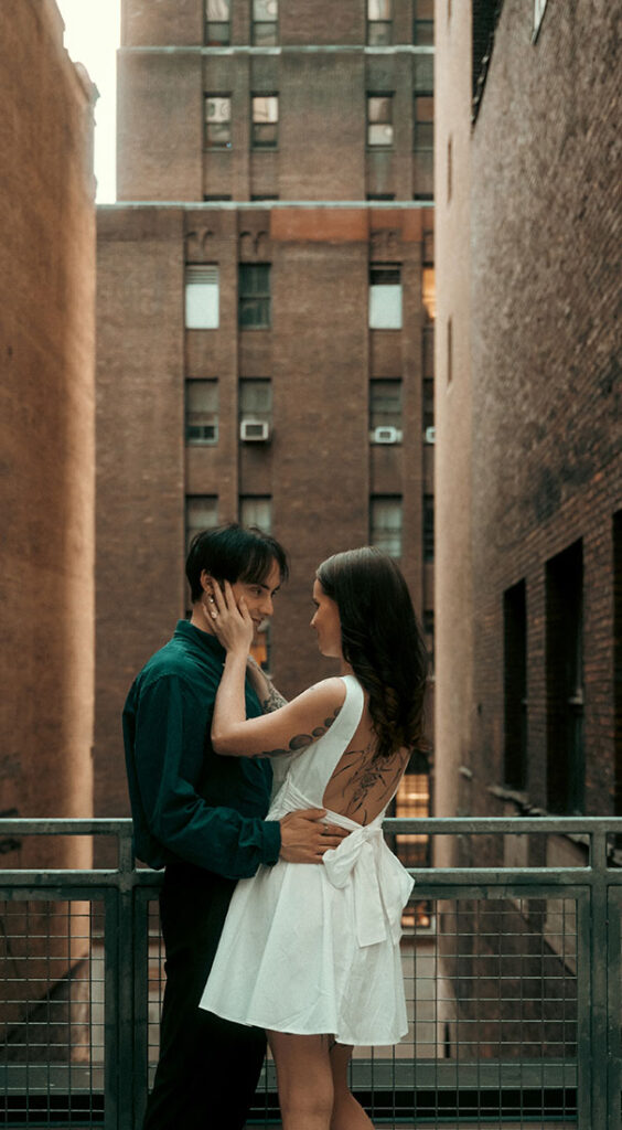Couple looking at each other at Downtown Pittsburgh