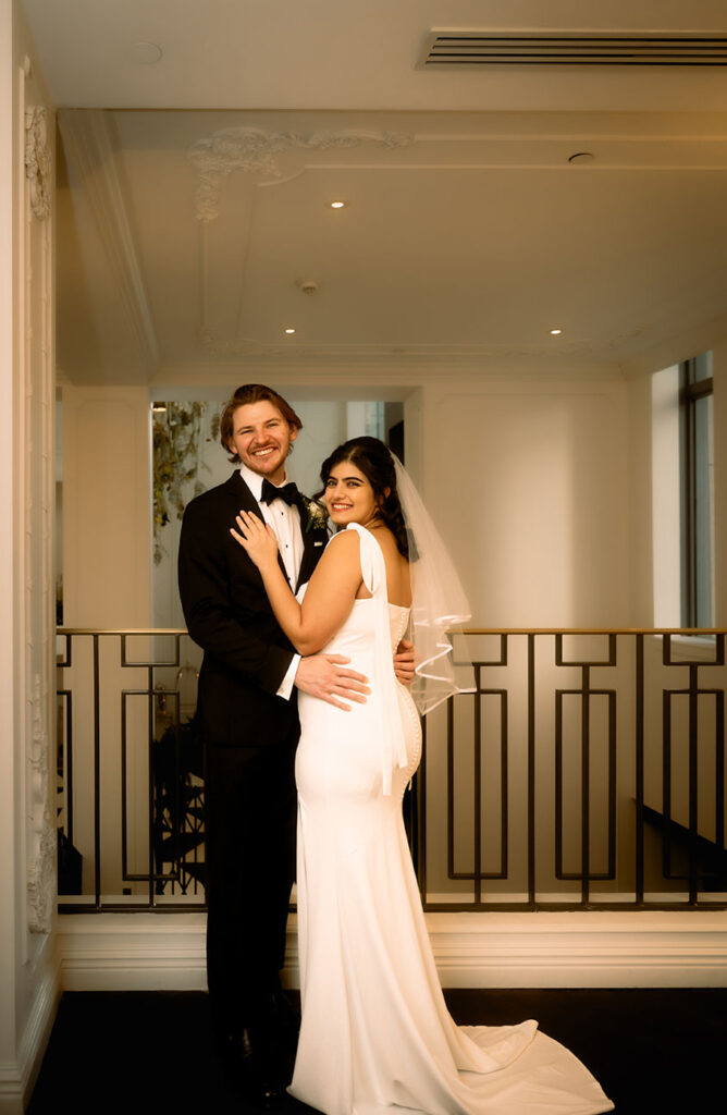 Bride and groom at the Kimpton Hotel Monaco before their courthouse elopement.