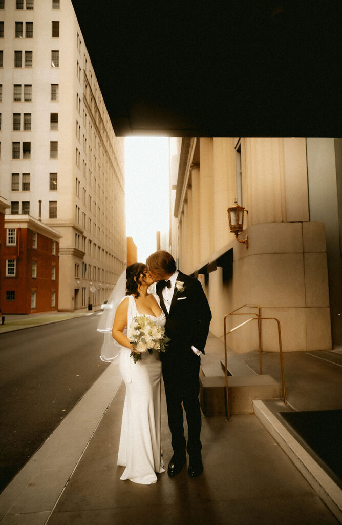 Bride and Groom walking towards their elopement at the Allegheny Courthouse in Downtown Pittsburgh 