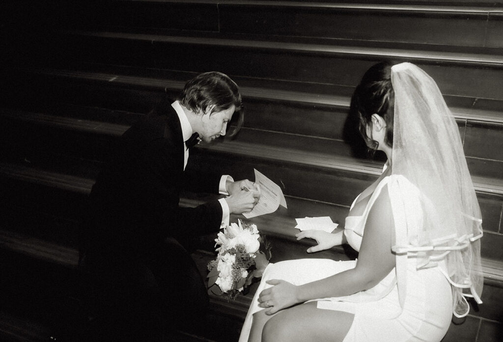 Aida and Zackery signing their Self Uniting Marriage license at the Allegheny Courthouse
