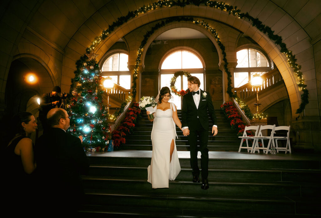 Intimate courthouse wedding ceremony with Aida and Zachery surrounded by close family and friends.