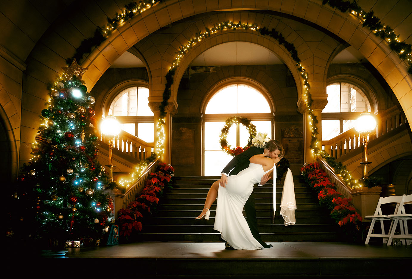 Intimate courthouse wedding ceremony with Aida and Zachery surrounded by close family and friends.